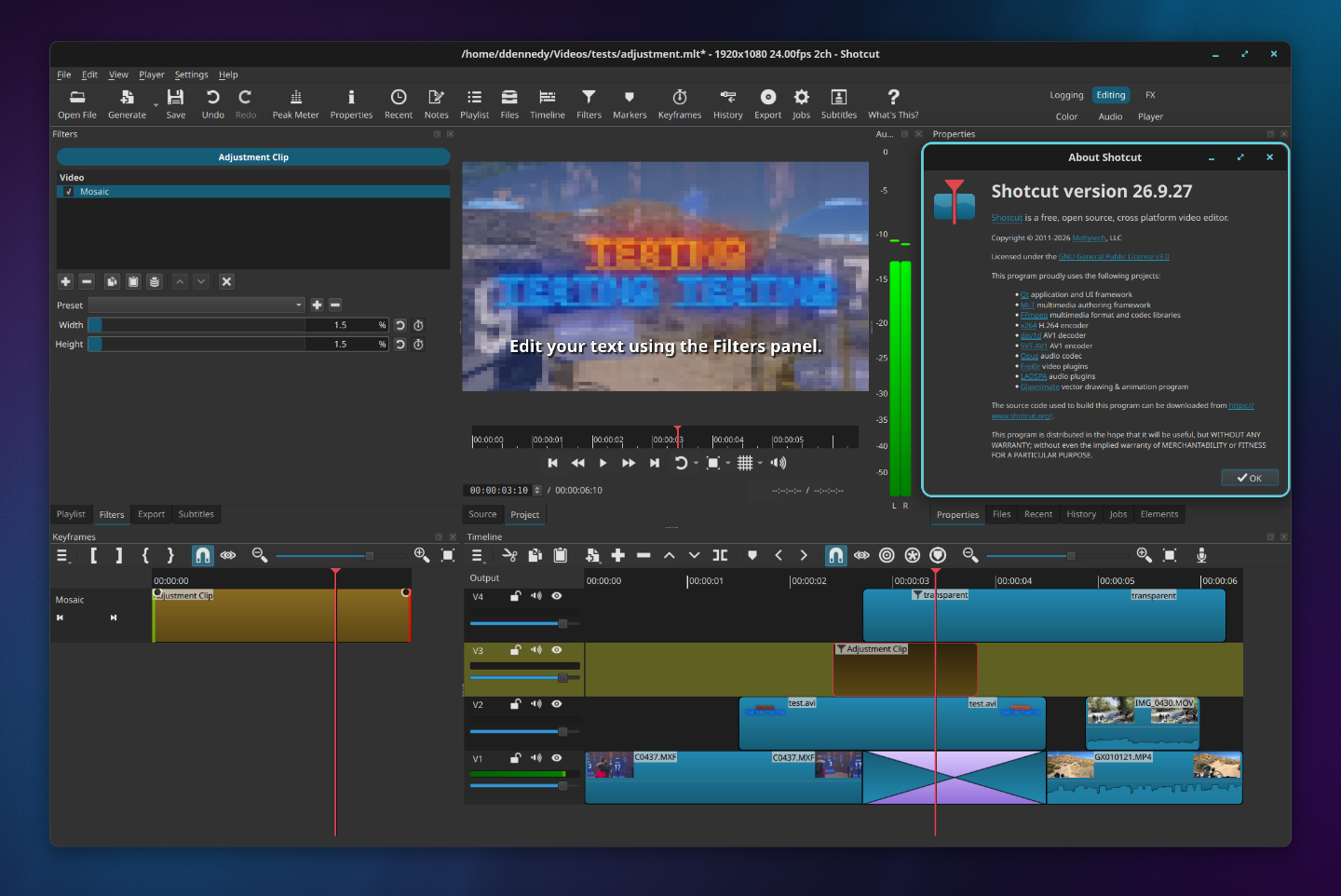 Shotcut 26.9.27 editing workspace with its About dialog above a multitrack timeline.